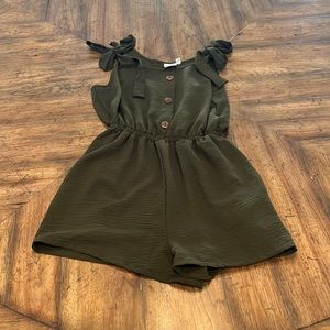 Small, green, romper